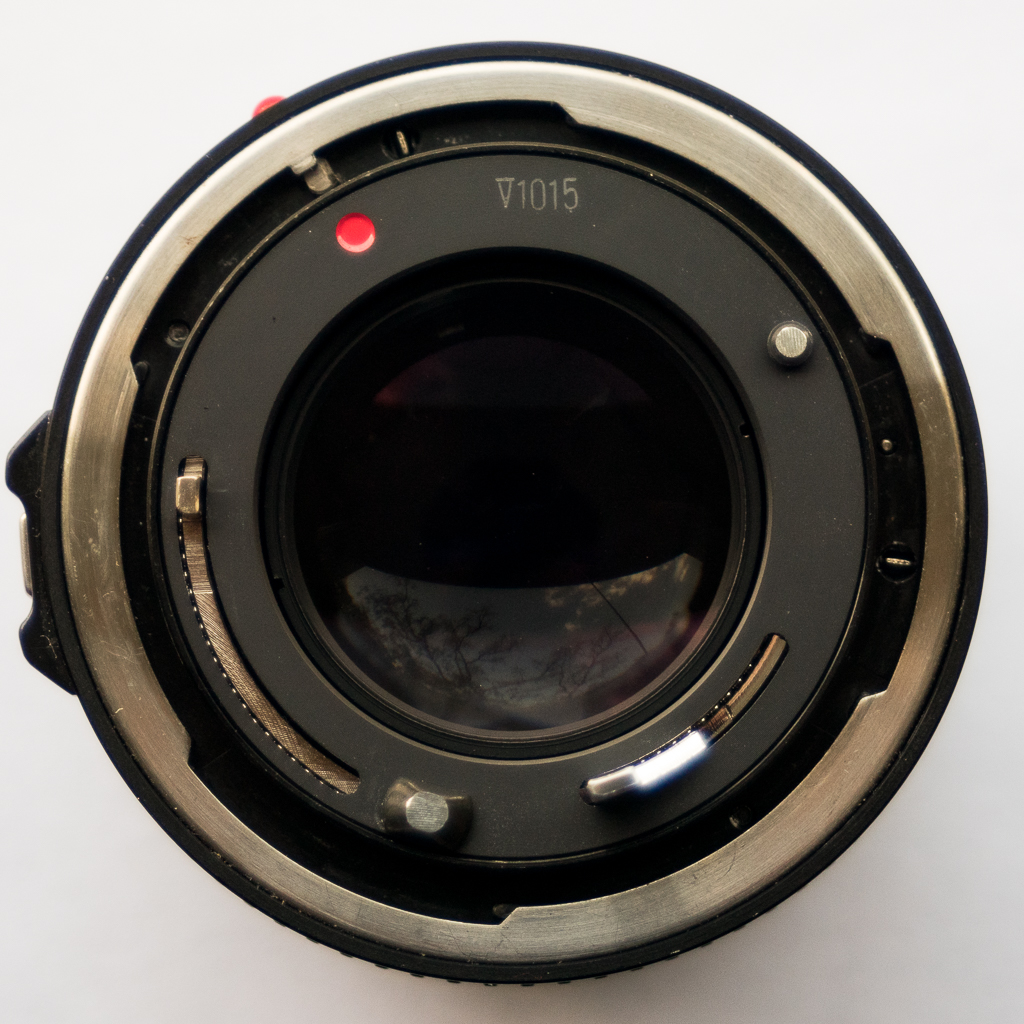where is serial number on canon camera